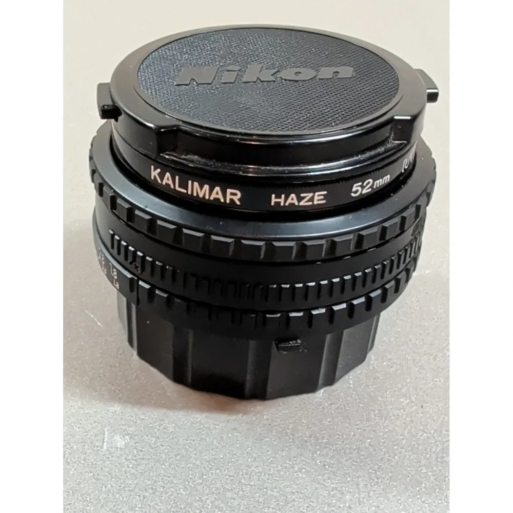 Nikon Series E 50mm f/1.8 Manual Focus Pancake Lens with Kalimar UV Filter Pouch